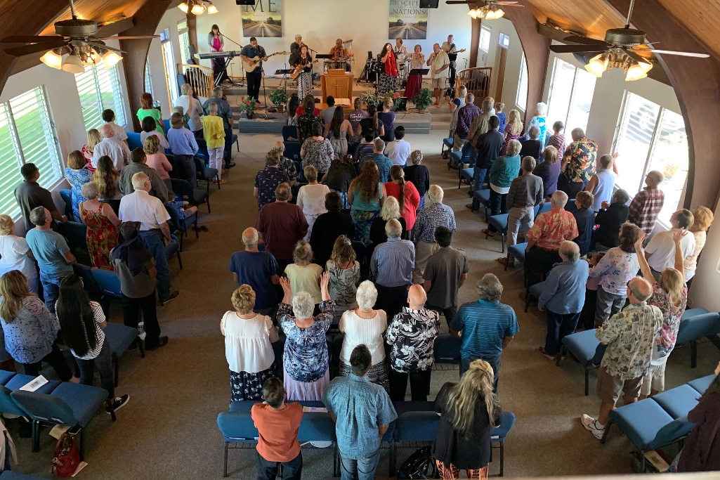 Hawaii church community gathering in worship representing the welcoming spirit of Faith Church Hawaii Inc where all are welcome to experience God's love